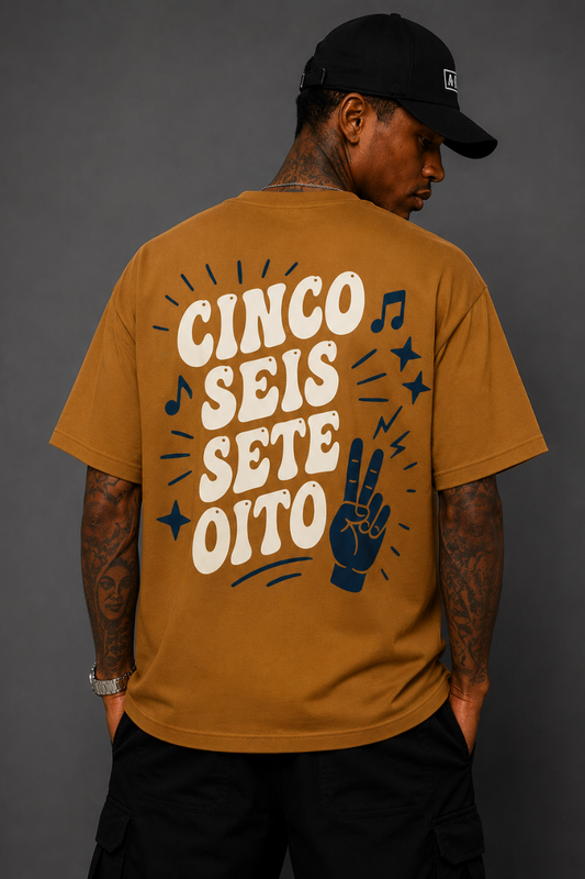 CAMISETA MANOS CAPS OVERSIZED ESSENTIAL NUMBER